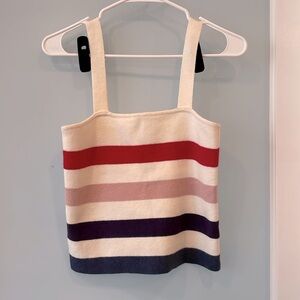 Super cute tube style top with straps. L